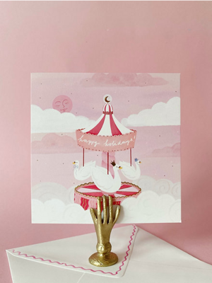 Luxe kerstkaart met geïllustreerde envelop 'magische carrousel'